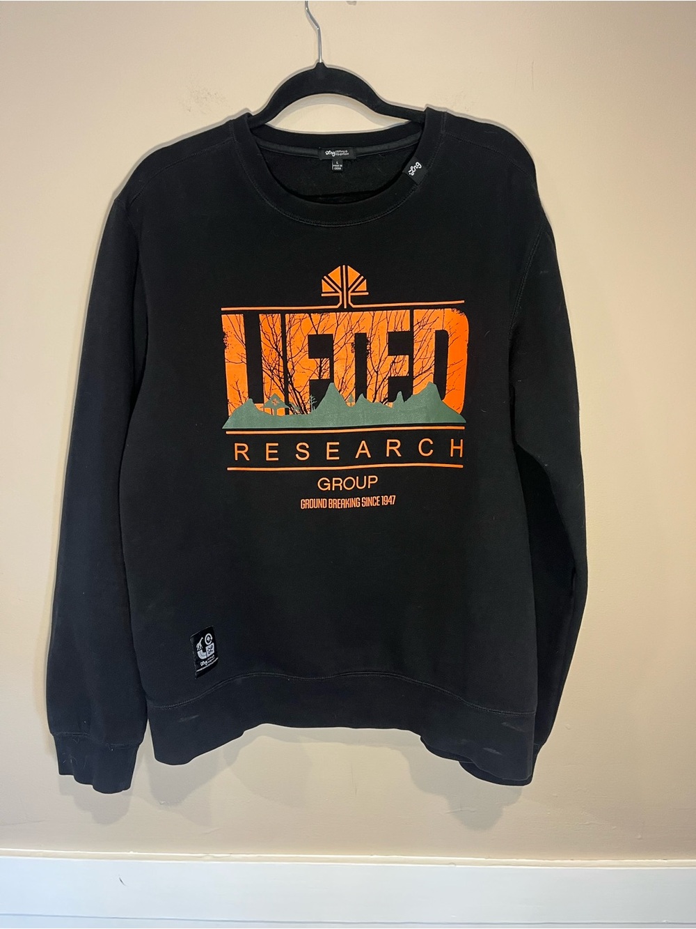 Lifted Research Group Black Crewneck Sweatshirt with Orange Graphic